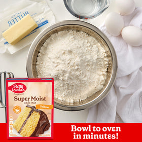 Baking Betty Crocker yellow cake in the oven fills the kitchen with aroma.