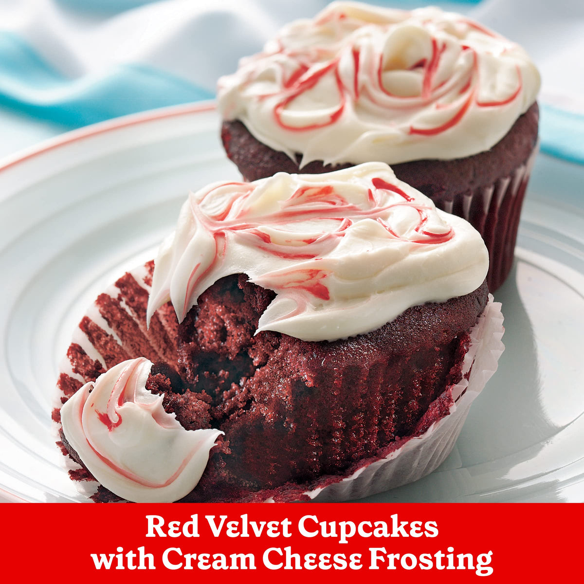 Spatula swirls Betty Crocker frosting on a layered cake.
