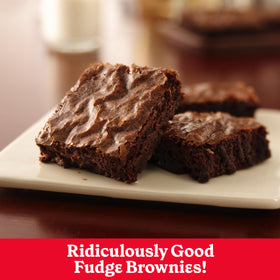 Betty Crocker fudge brownie mix powder closeup, rich cocoa flavor ready in minutes.