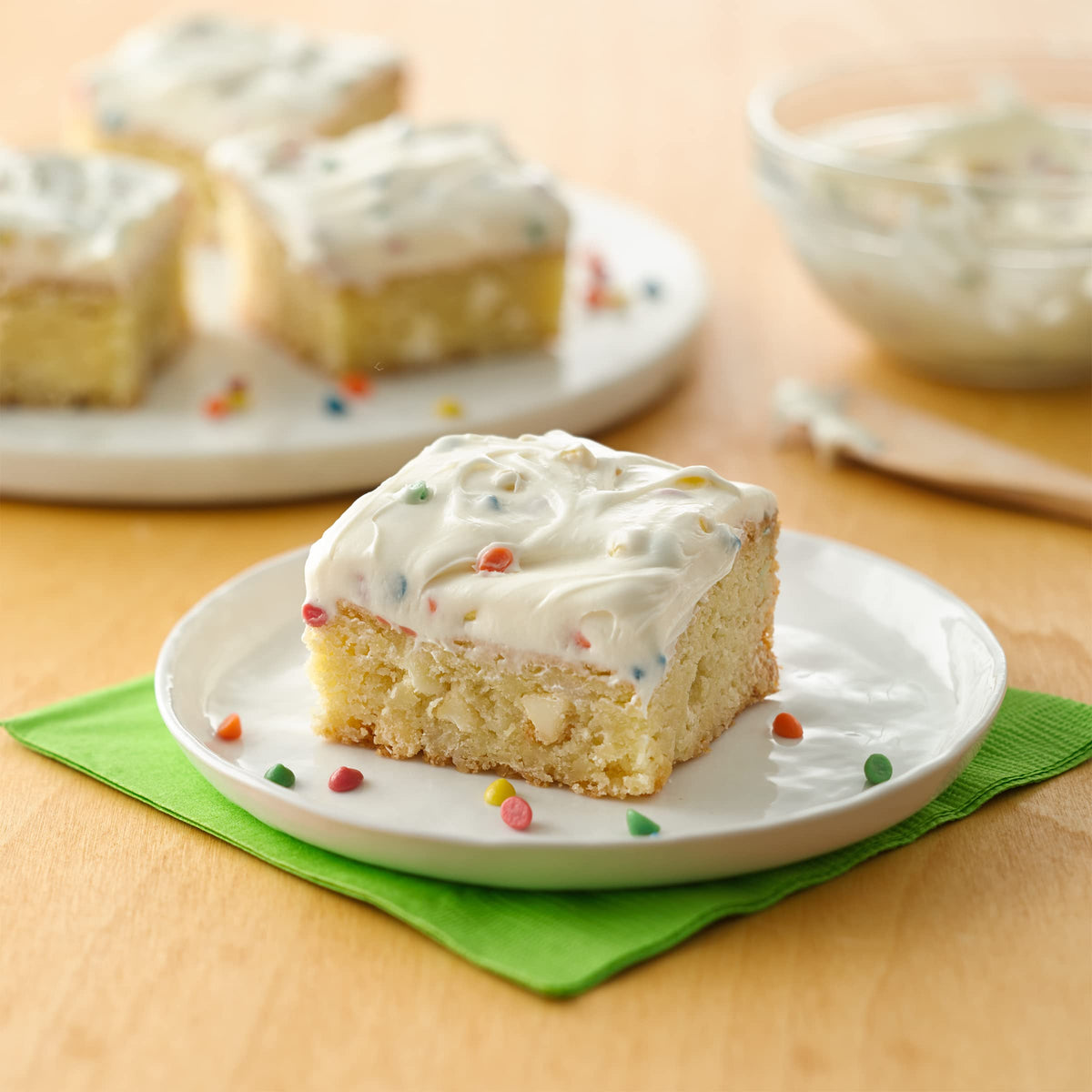 Betty Crocker Rainbow Chip Frosting spread on cupcakes for a quick treat.