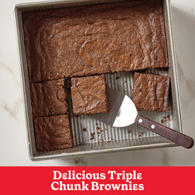 Betty Crocker Supreme Triple Chunk Brownie Mix close-up of chocolate chips and chunks for rich brownies.