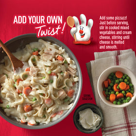 Creamy sauce poured over cooked fettuccine highlights comforting weeknight option