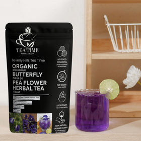 Beverly Hills Tea Time butterfly pea loose leaves steeping with citrus for color shift.