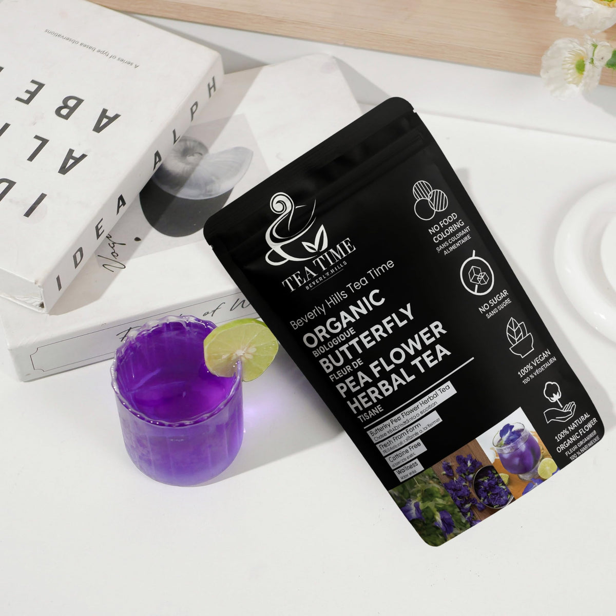 Beverly Hills Tea Time color-changing butterfly pea tea in a dessert shot demonstrates versatile use.