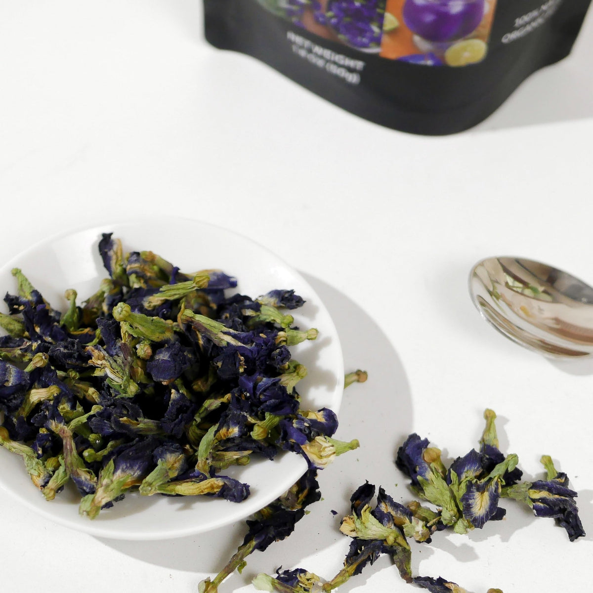 Beverly Hills Tea Time dried butterfly pea flowers close-up emphasizes natural, caffeine-free herbal goodness.