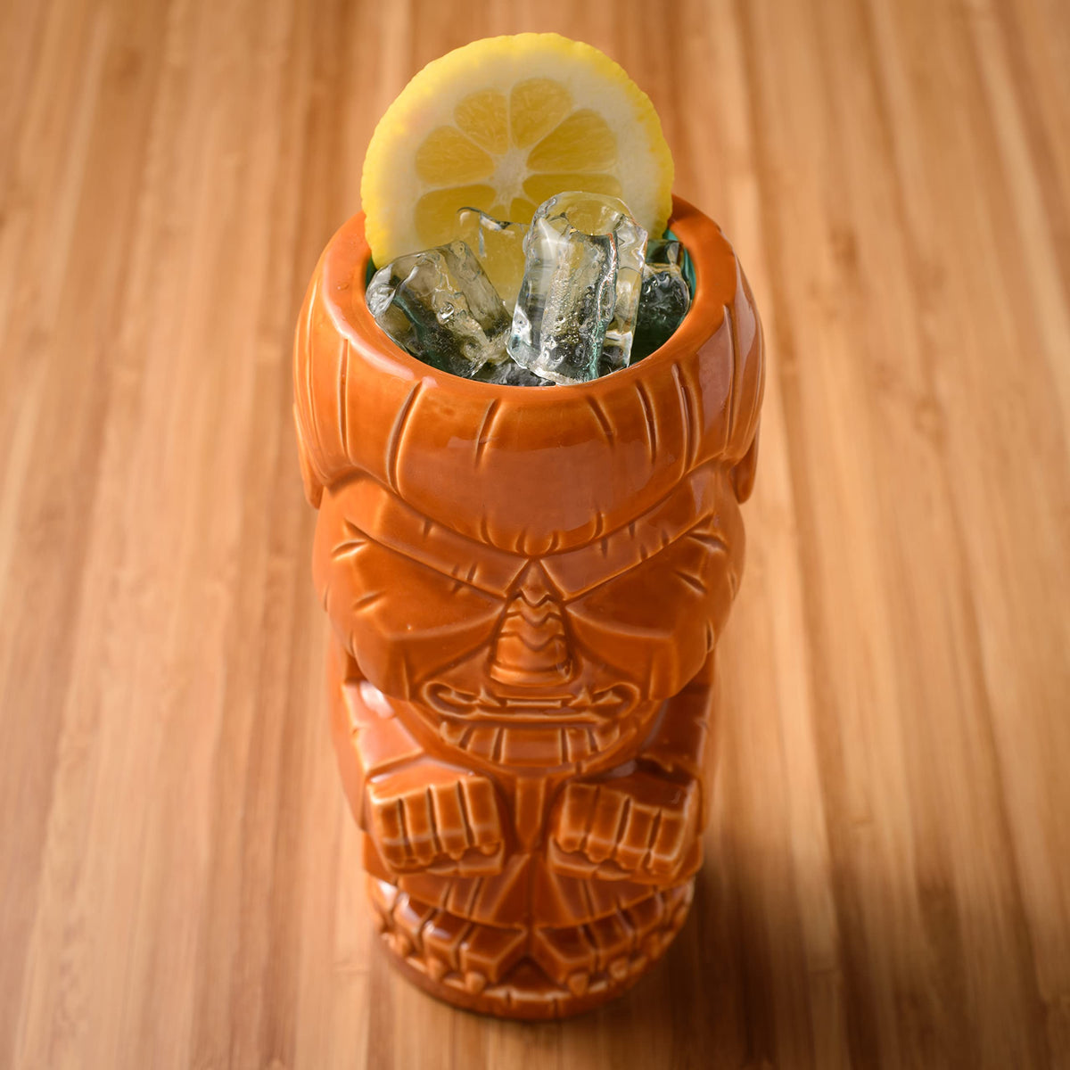 BG Reynolds Orgeat with orange garnish beside glass