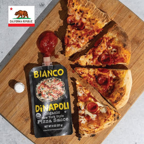 Bianco DiNapoli open-pouch-with-spoon invites easy tasting and meal prep.