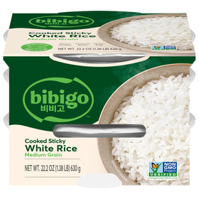 Bibigo Korean Sticky White Rice bowl steaming, ready as a quick side.
