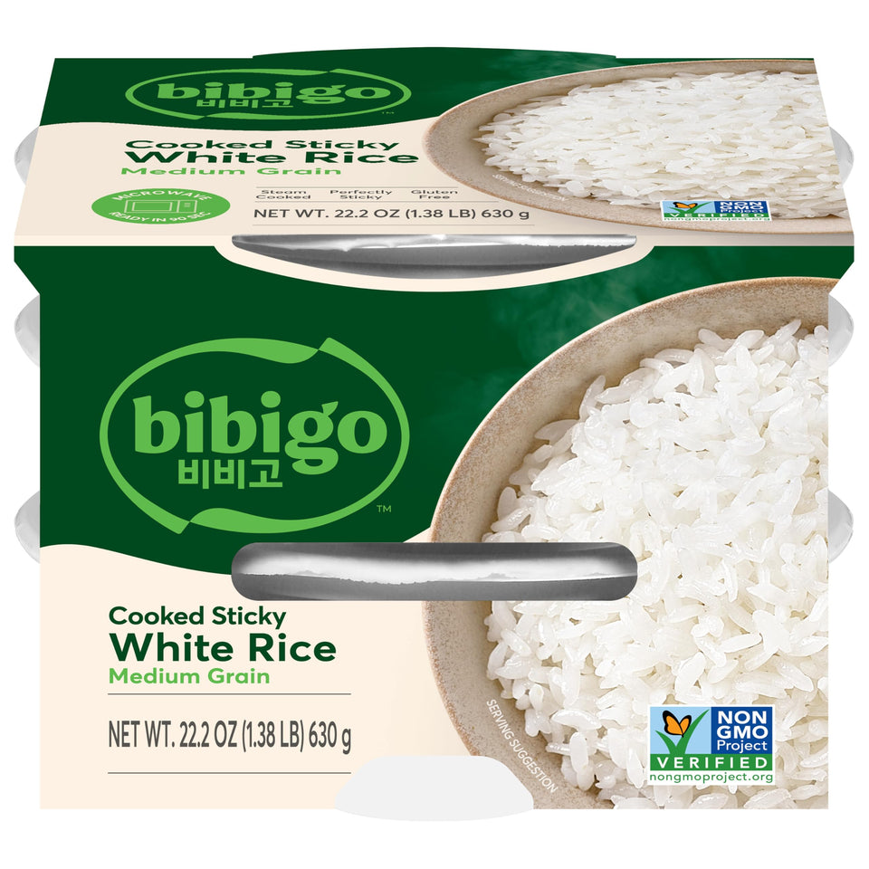 Bibigo Korean Sticky White Rice bowl steaming, ready as a quick side.