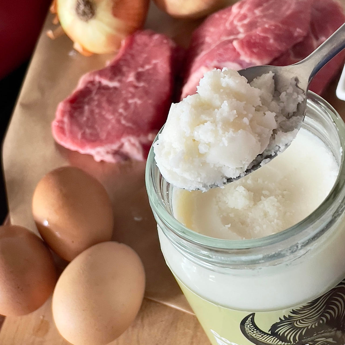 Big Crazy Buffalo bison tallow label emphasizing nutrient-rich fats and vitamins.
