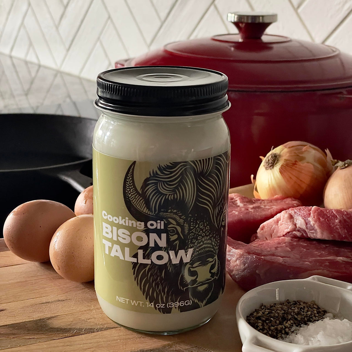 Big Crazy Buffalo bison tallow applied to skin for hydrating care.
