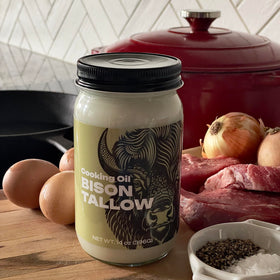 Big Crazy Buffalo bison tallow applied to skin for hydrating care.
