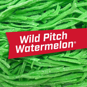 Concession stand moment enjoying Wild Pitch Watermelon during baseball game.