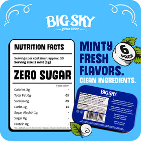 Opened Big Sky peppermint mint tin with visible mints for quick refreshment.