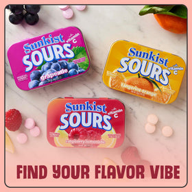 Big Sky Sunkist Sours Raspberry Lemonade candy close-up; vibrant color, tangy aroma.