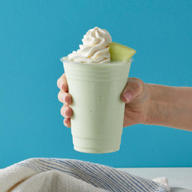 Big Train Dragonfly Honeydew Blended Crème Frappe whipped-cream topping adds indulgent texture.