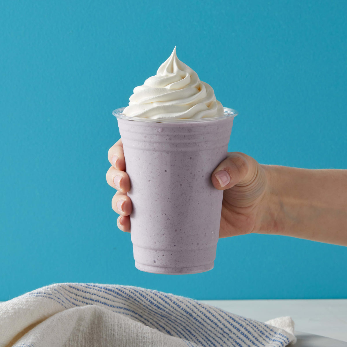 Creamy blended frappé using Dragonfly taro mix with silky texture