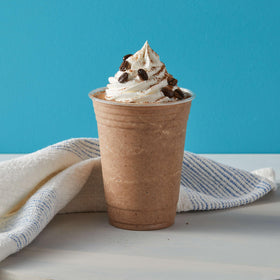 Big Train Low Carb Mocha arabica-beans backdrop; premium coffee base in every mix.