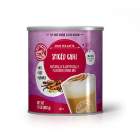 Big Train Spiced Chai Tea Latte Mix packaging on shelf, easy home beverage option.