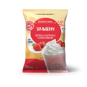 Big Train Strawberry Blended Crème Mix packaging on a kitchen counter, ready for quick drinks.