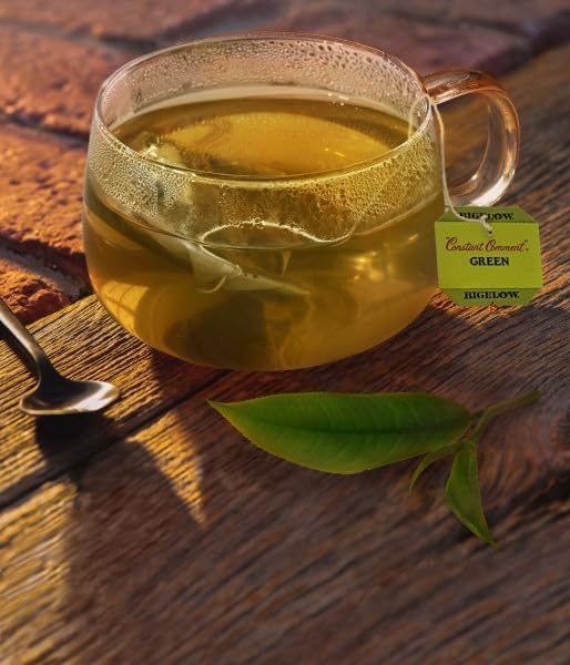 Cup with Constant Comment Green Tea brewing for a flavorful hot drink