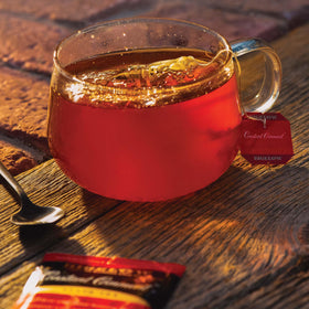 Close-up of orange rind and spice notes in Bigelow Constant Comment tea for a comforting brew.