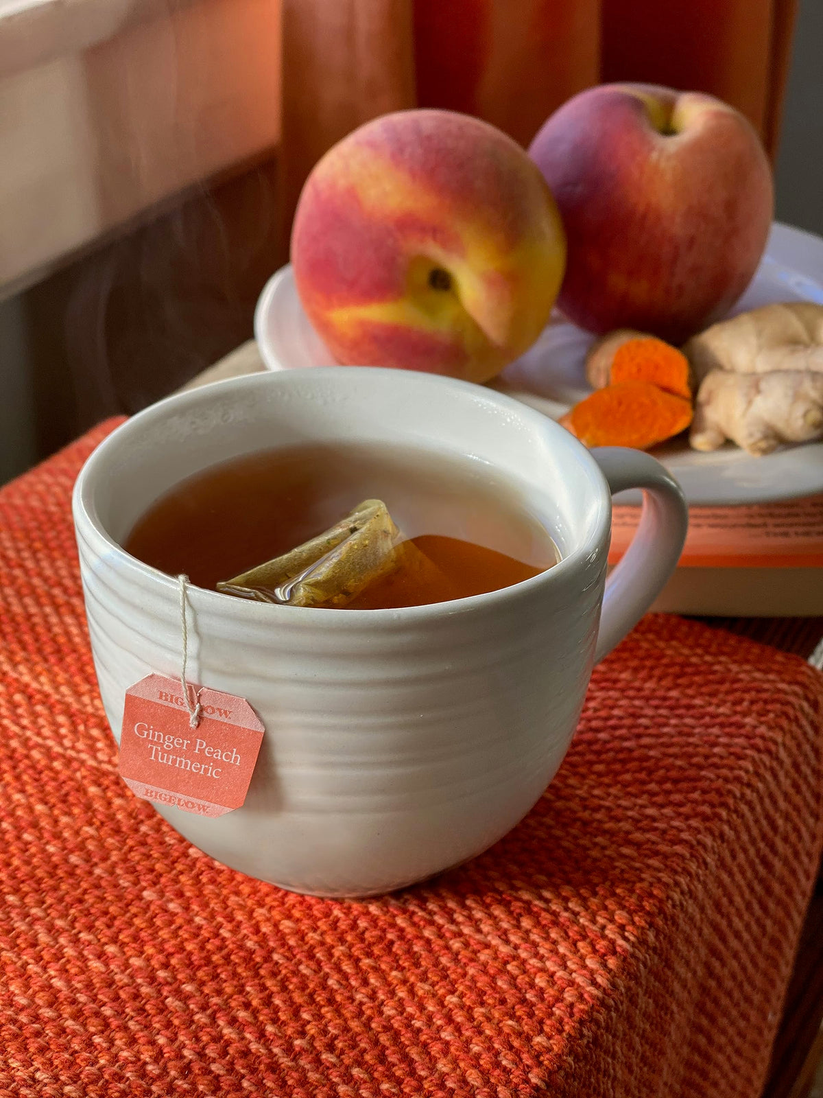 Bigelow Ginger Peach Turmeric Tea bags highlight convenient, individually wrapped sachets