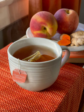 Bigelow Ginger Peach Turmeric Tea bags highlight convenient, individually wrapped sachets