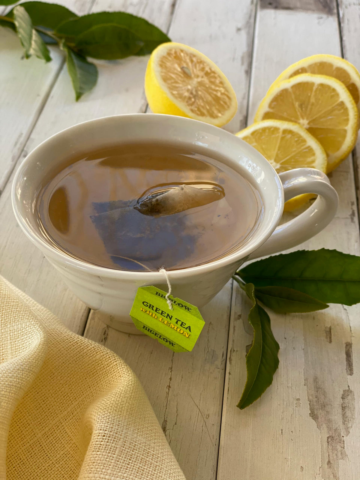 Bigelow Green with Lemon tea cup steeping, highlighting citrus-forward aroma