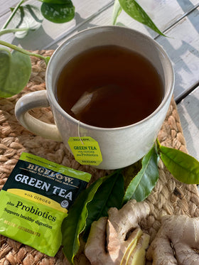Bigelow Green Tea with Ginger Plus Probiotics tea bag close-up highlighting aroma