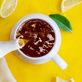 Bigelow Lemon Lift tea bag closeup showing lemon notes and spice.