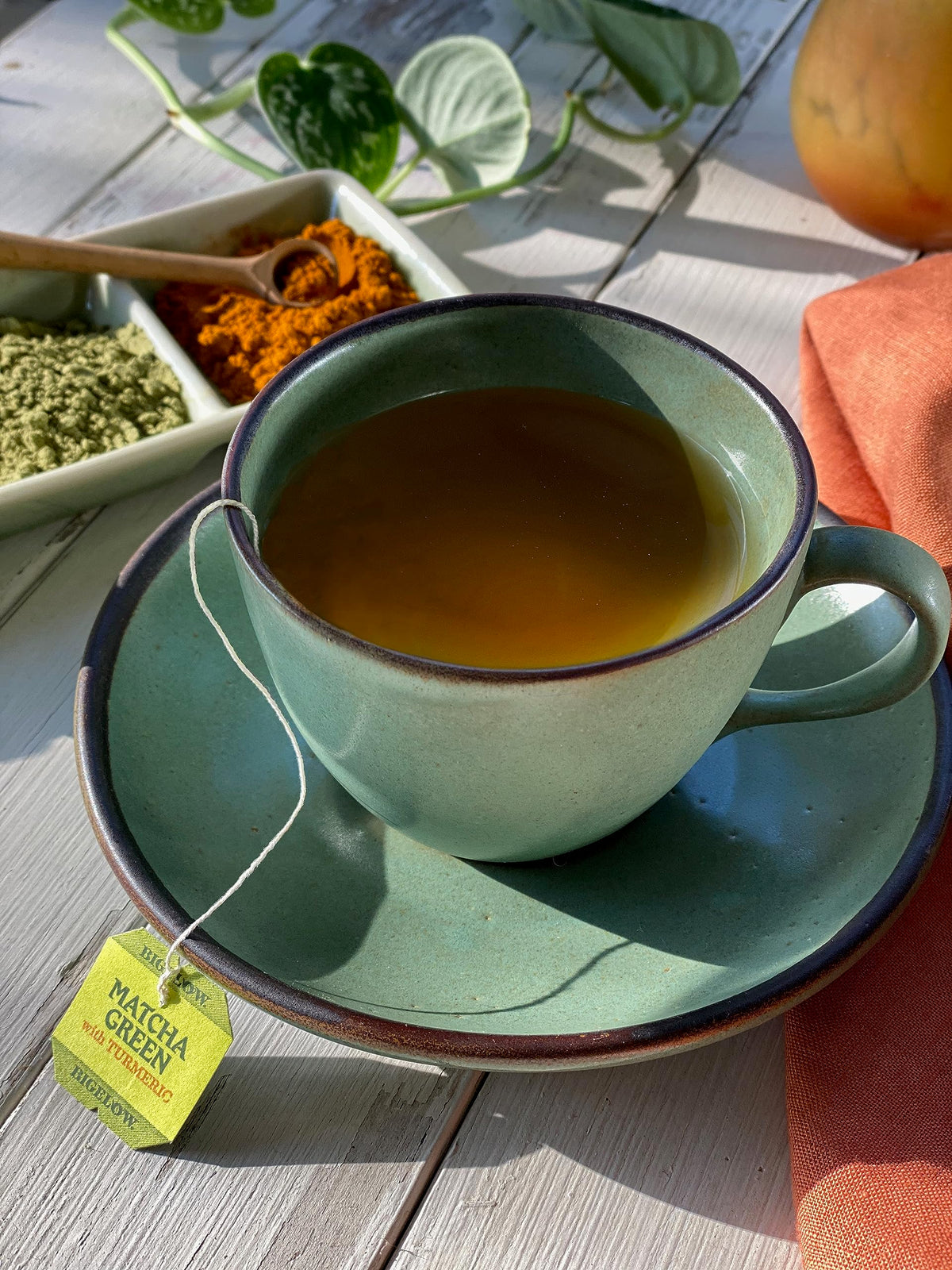Bigelow Matcha Green Tea with Turmeric steeping cup releases a vibrant aroma