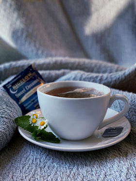 Cup of Bigelow Sweet Dreams steeping for a soothing evening ritual.