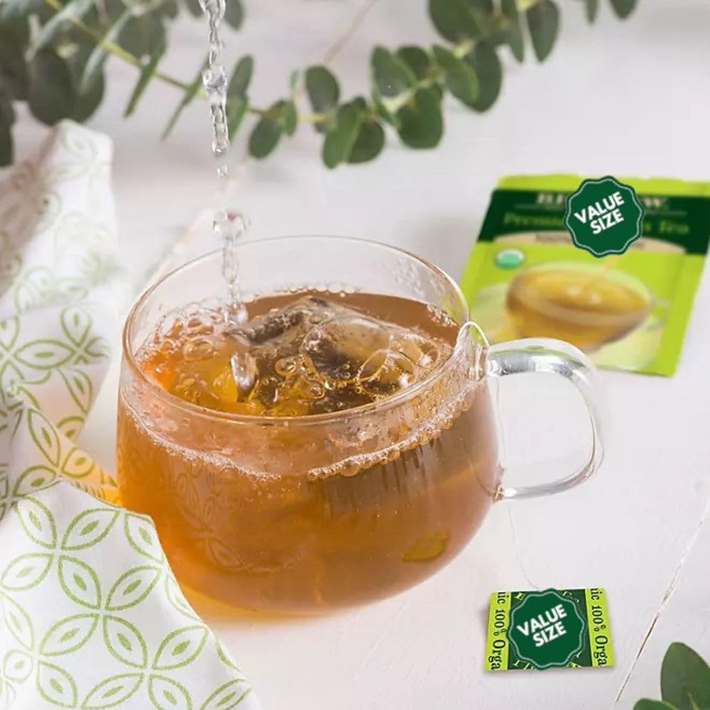 Bigelowwss Organic Green Tea bags close-up highlighting delicate, smooth flavor.