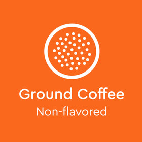 BIGGBY medium roast beans on a tray, offering balanced flavor.
