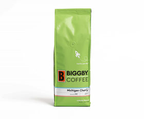 BIGGBY Michigan Cherry ground coffee packaging highlights bold cherry flavor and fresh roast.