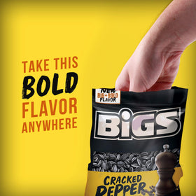 BIGS cracked pepper seeds with sea salt visible on the scene for snacking.
