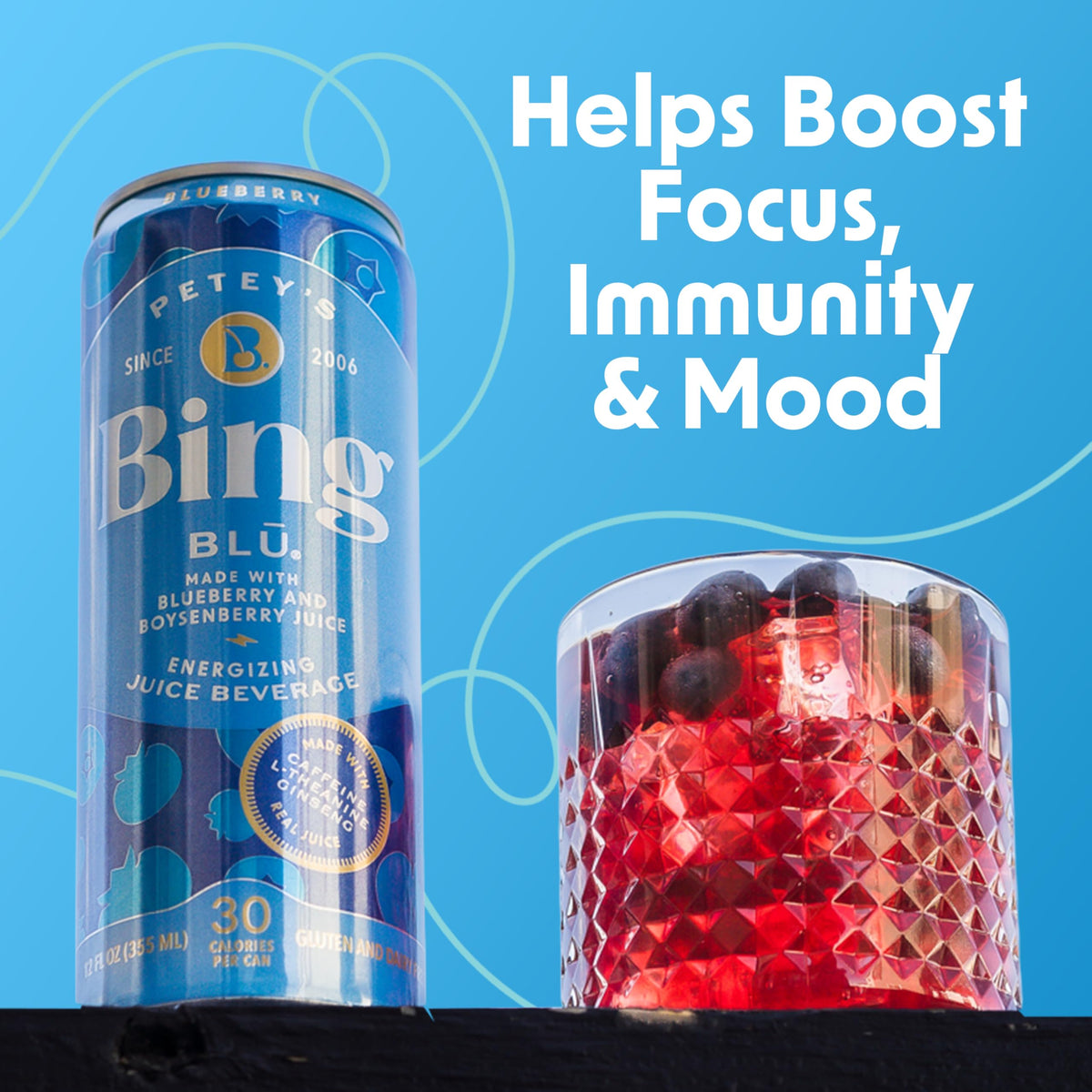 BING Blueberry Energizing Juice Beverage label close-up shows caffeine, vitamins, and ginseng.