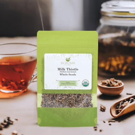 Biokoma milk thistle tea brewed in a cup with steam