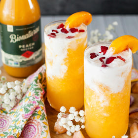 Bionaturae Peach Nectar label highlights non-GMO and organic attributes.