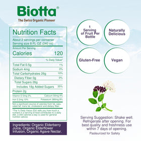 Biotta glass with elderberry juice, vibrant color.