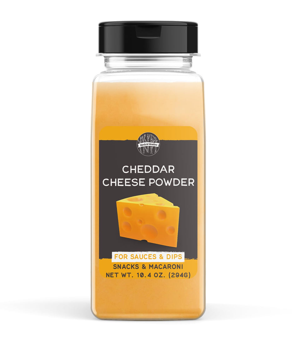 Birch & Meadow cheddar cheese powder jar close-up for rich flavor enhancement.