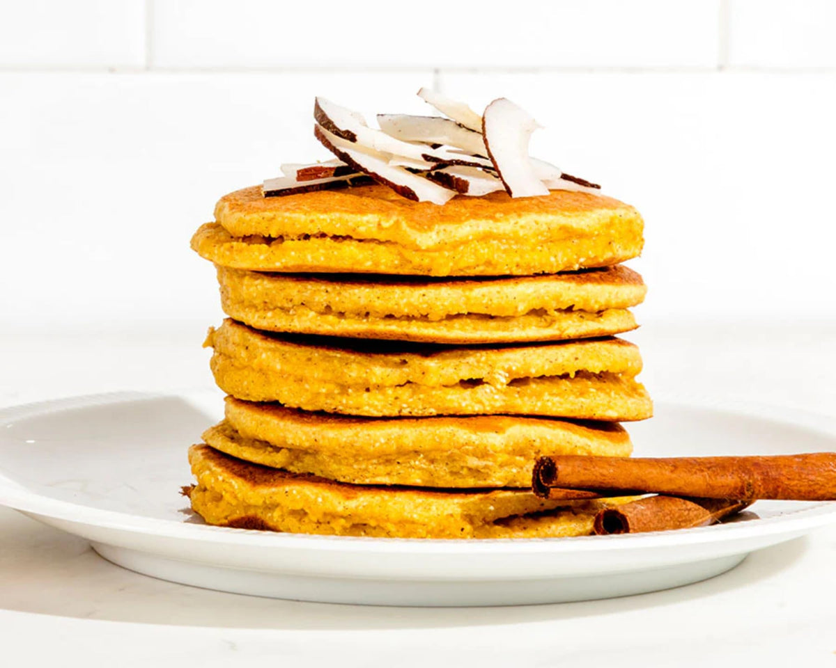 Fluffy Birch Benders pumpkin pancakes stacked with syrup for weekend brunch.