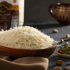 Bisvua chocolate bar with pistachio dessert featuring kataifi crunch.