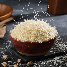 Bisvua Kataifi shredded dough close-up shows delicate strands for crispy layers.