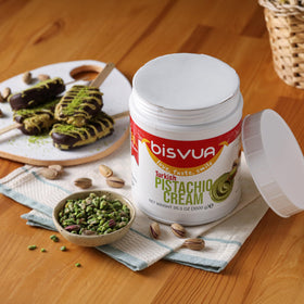 Bisvua Pistachio Cream 30 percent shown with kunefe for serving