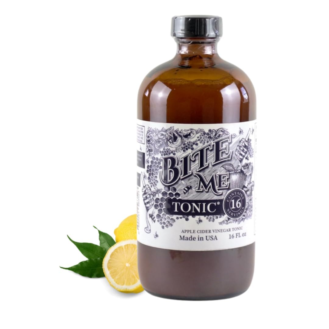 Bite Me Tonic bottle close-up highlights Manuka honey and apple cider vinegar for daily flavor.