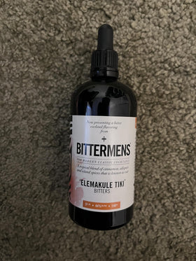 Bittermens Elemakule Tiki Bitters in a tiki cocktail, adding spice depth.