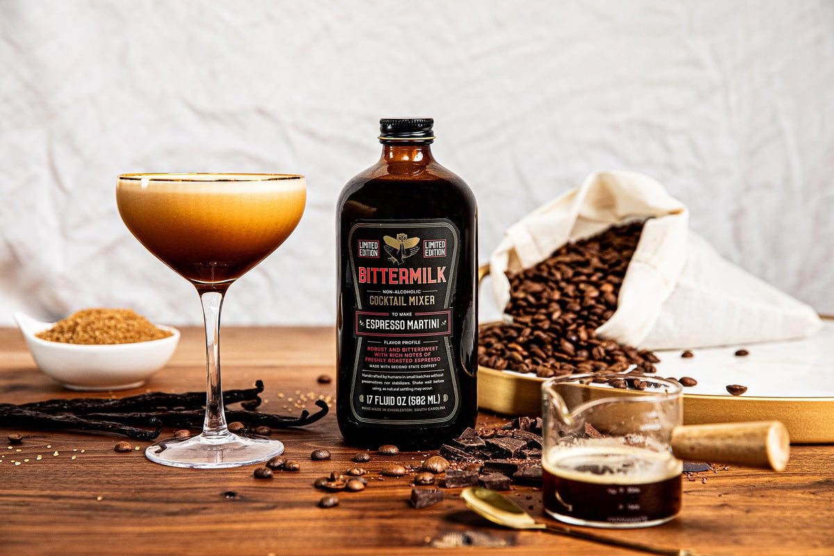 Prepared Espresso Martini in a stemmed glass with coffee bean garnish and Bittermilk.