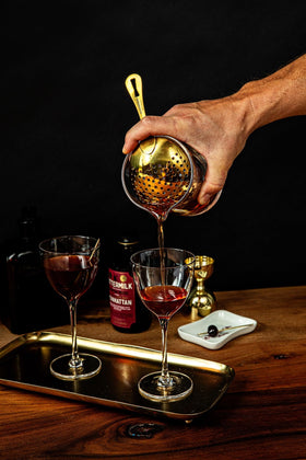 Stirring Bittermilk Manhattan mix with ice to reveal balanced aroma